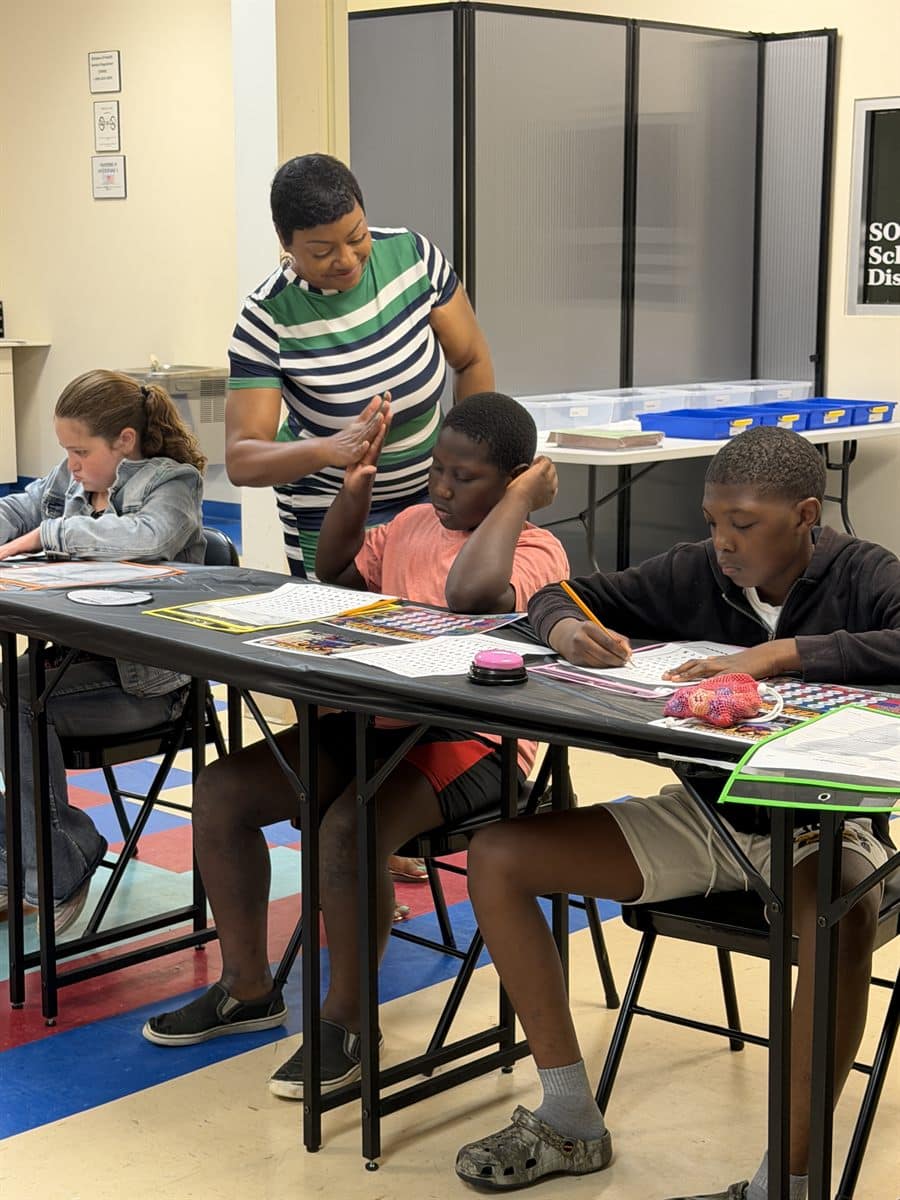 Counselor guiding a small group through a supportive session